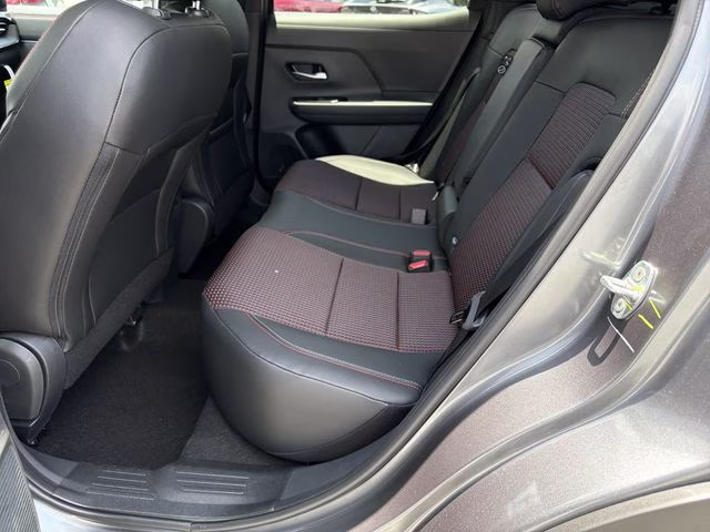 2026 Gun Metallic/Scarlet Ember Tintcoat Nissan Kicks SR AWD SUV