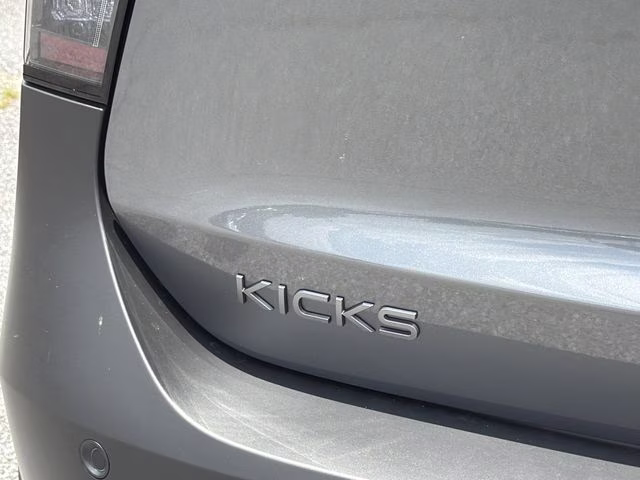 2026 Gun Metallic/Scarlet Ember Tintcoat Nissan Kicks SR AWD SUV