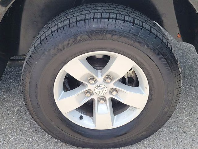 2024 Diamond Black Crystal Pearlcoat Ram 1500 Classic SLT RWD Truck