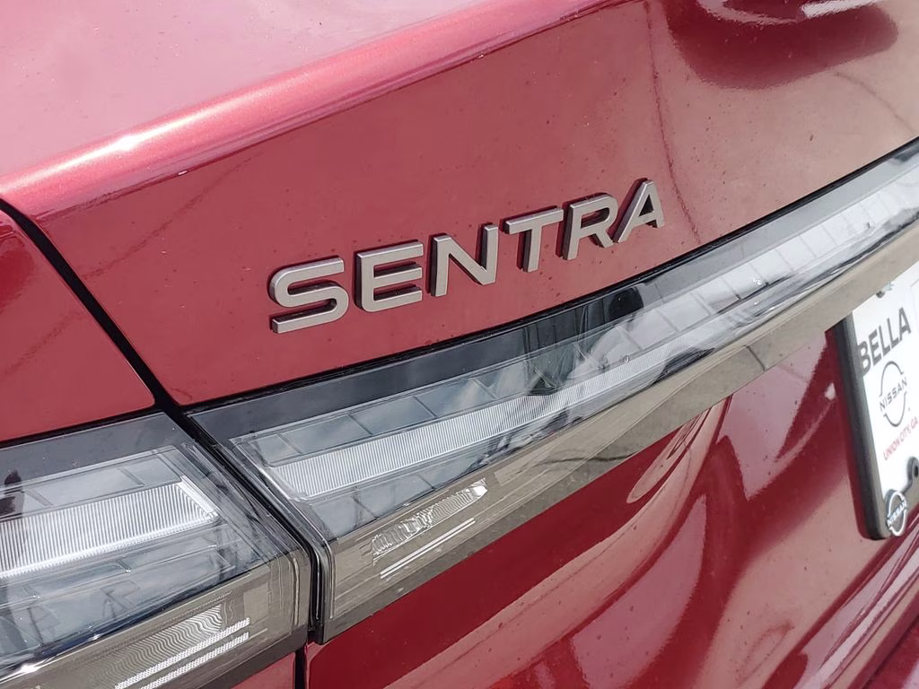 2026 Scarlet Ember Tintcoat Nissan Sentra SV FWD Sedan