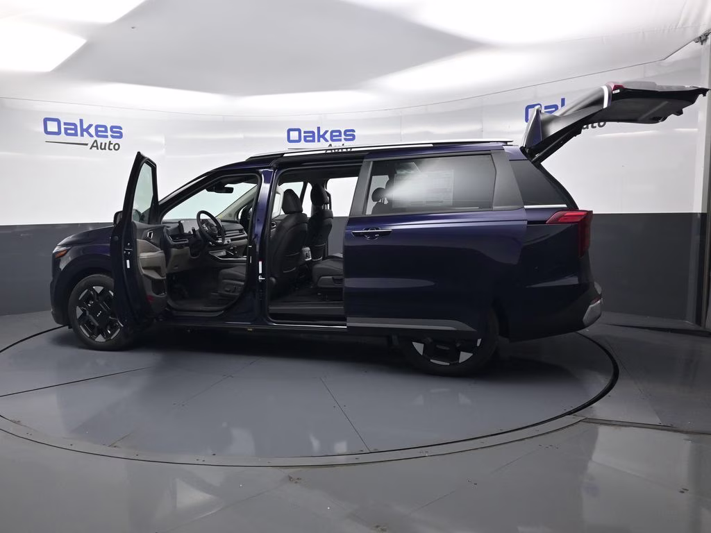 2026 Deep Chroma Blue Kia Carnival EX FWD Van