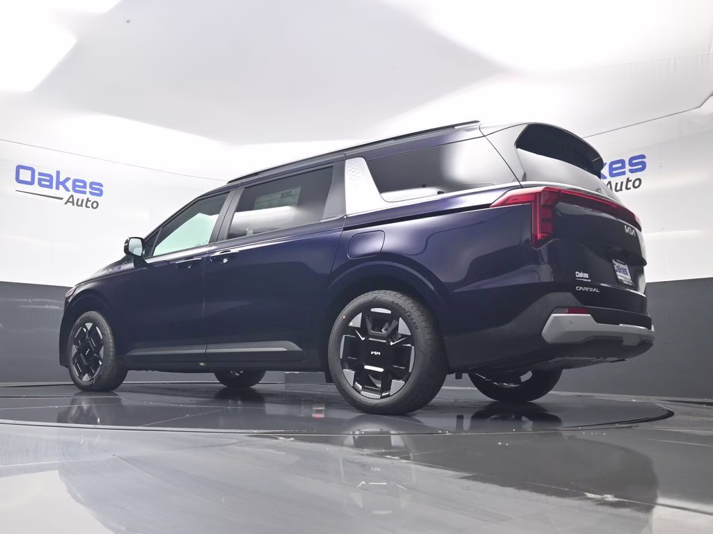 2026 Deep Chroma Blue Kia Carnival EX FWD Van
