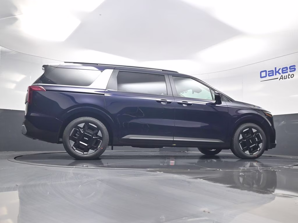 2026 Deep Chroma Blue Kia Carnival EX FWD Van