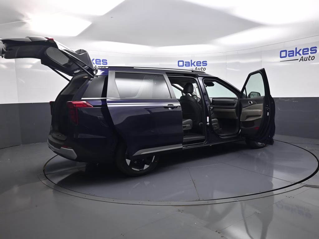 2026 Deep Chroma Blue Kia Carnival EX FWD Van