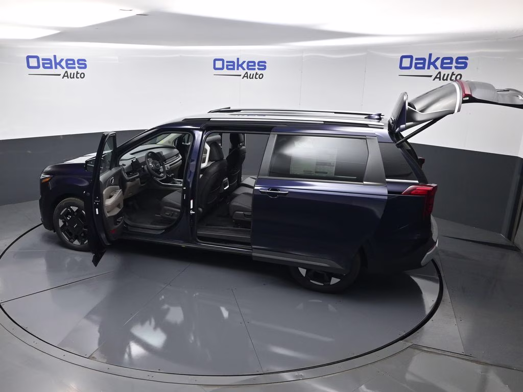 2026 Deep Chroma Blue Kia Carnival EX FWD Van