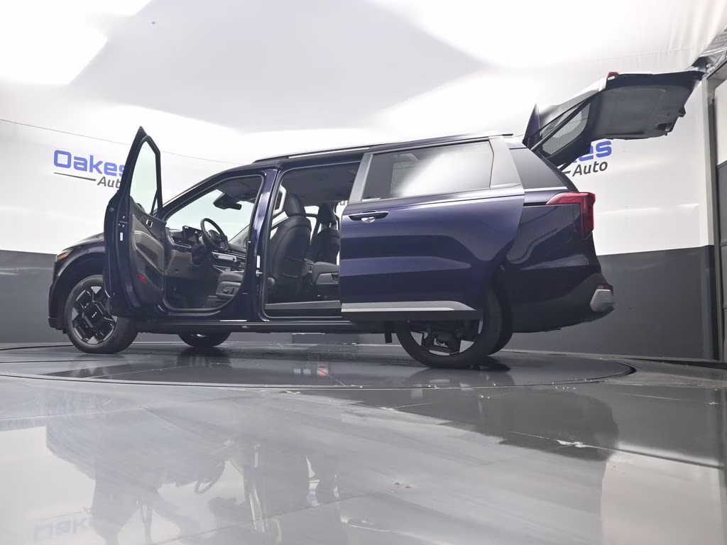 2026 Deep Chroma Blue Kia Carnival EX FWD Van