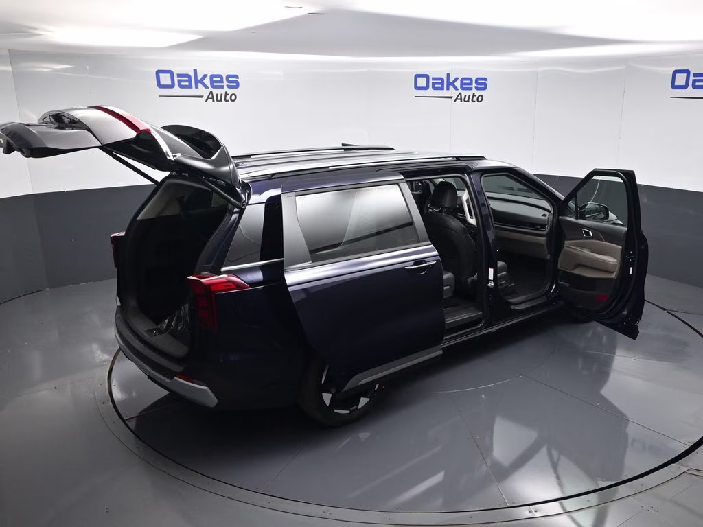 2026 Deep Chroma Blue Kia Carnival EX FWD Van