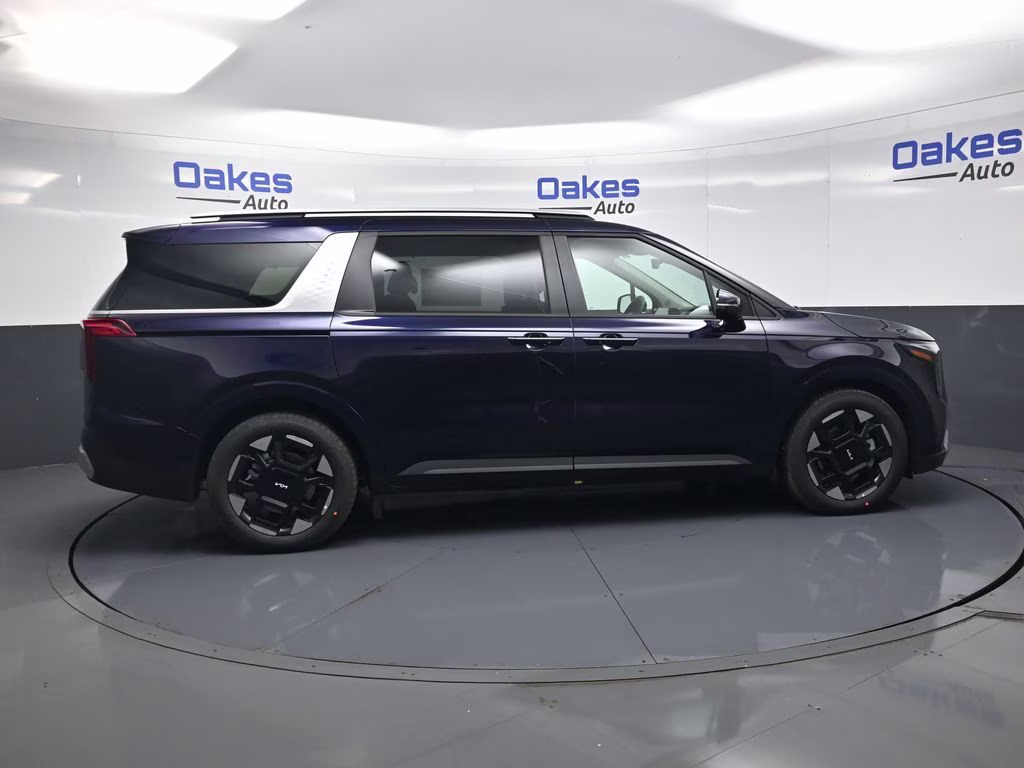 2026 Deep Chroma Blue Kia Carnival EX FWD Van