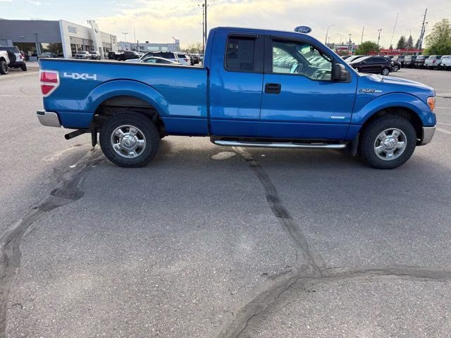 2012 Blue Flame Metallic Ford F-150 XLT 4X4 Truck