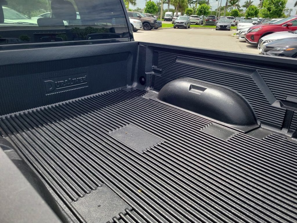 2024 Diamond Black Crystal Pearlcoat Ram 1500 Classic SLT RWD Truck