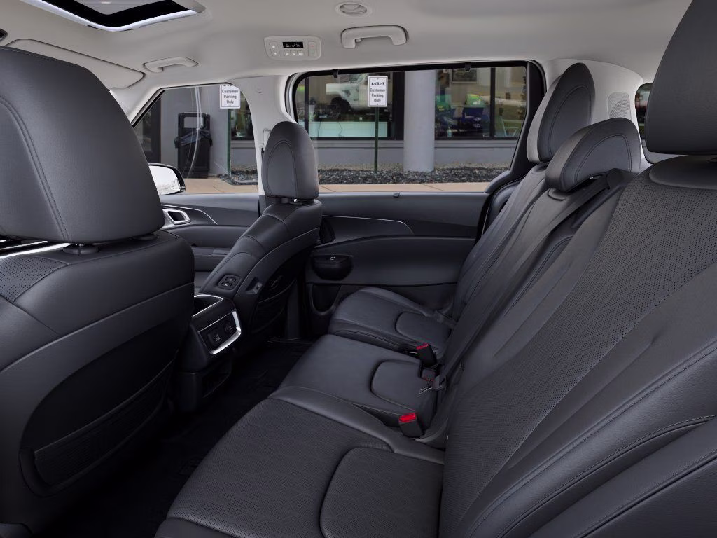 2026 Snow White Pearl Kia Carnival Hybrid SX FWD Van