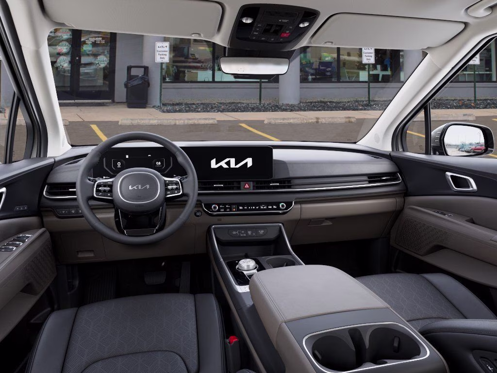 2026 Ivory Silver Kia Carnival Hybrid SX FWD Van