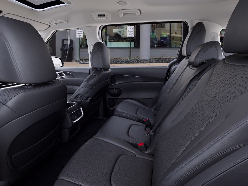 2026 Snow White Pearl Kia Carnival Hybrid SX FWD Van