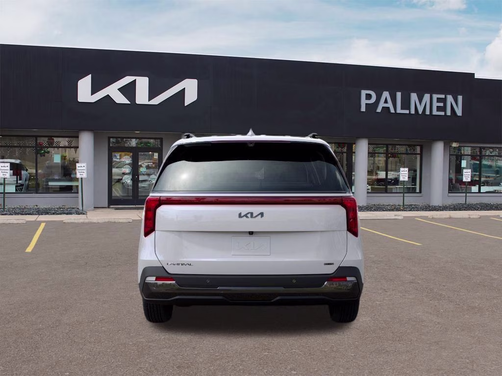 2026 Snow White Pearl Kia Carnival Hybrid SX FWD Van
