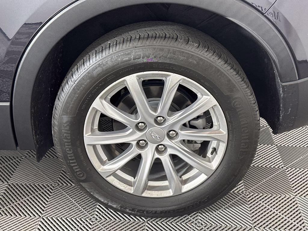 2023 Galactic Gray Metallic Cadillac XT4 Luxury AWD SUV