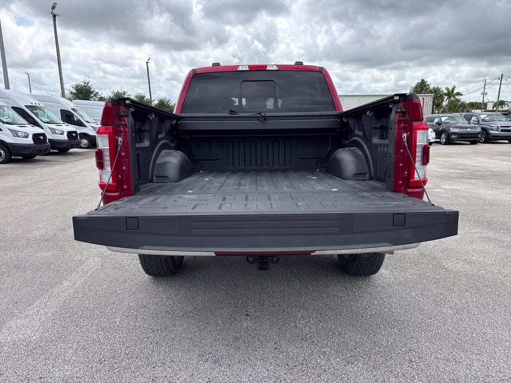 2023 Rapid Red Metallic Tinted Clearcoat Ford F-150 Lariat 4X4 Truck