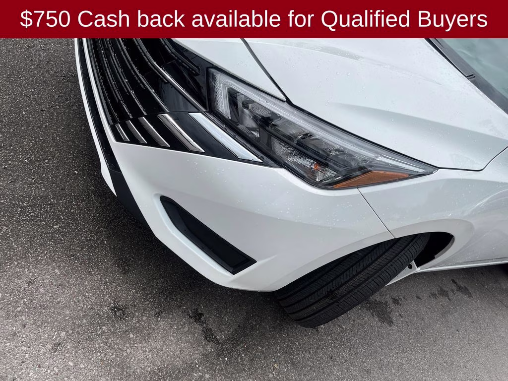 2025 Aspen White Tricoat Nissan Versa 1.6 SV FWD Sedan
