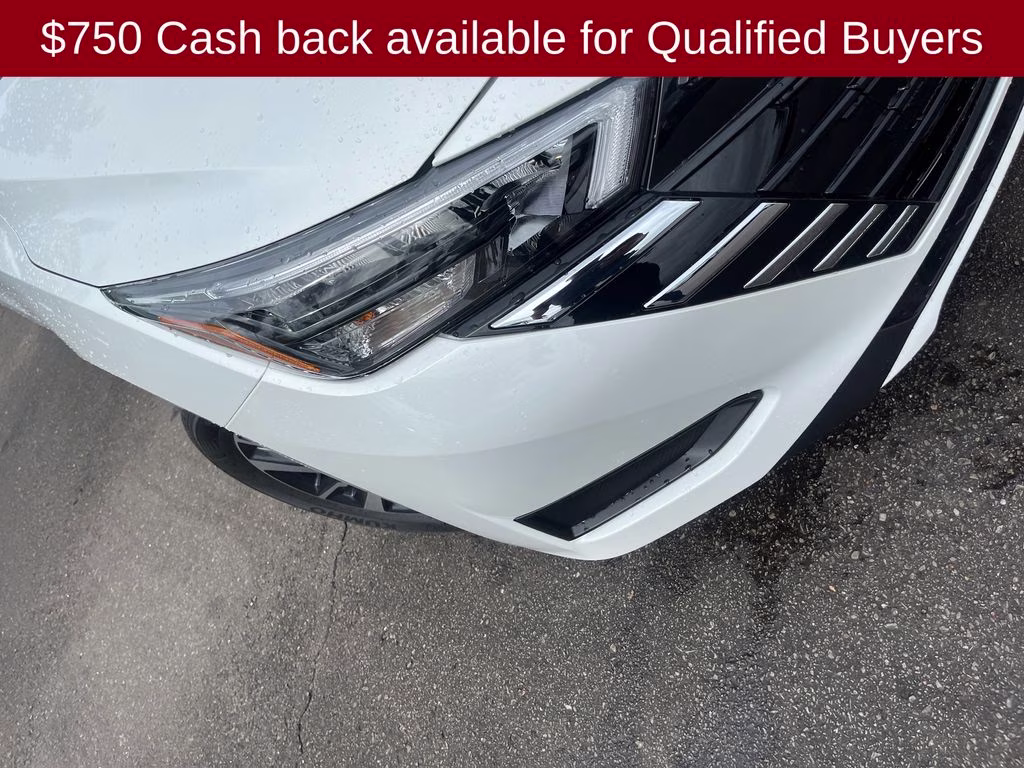 2025 Aspen White Tricoat Nissan Versa 1.6 SV FWD Sedan