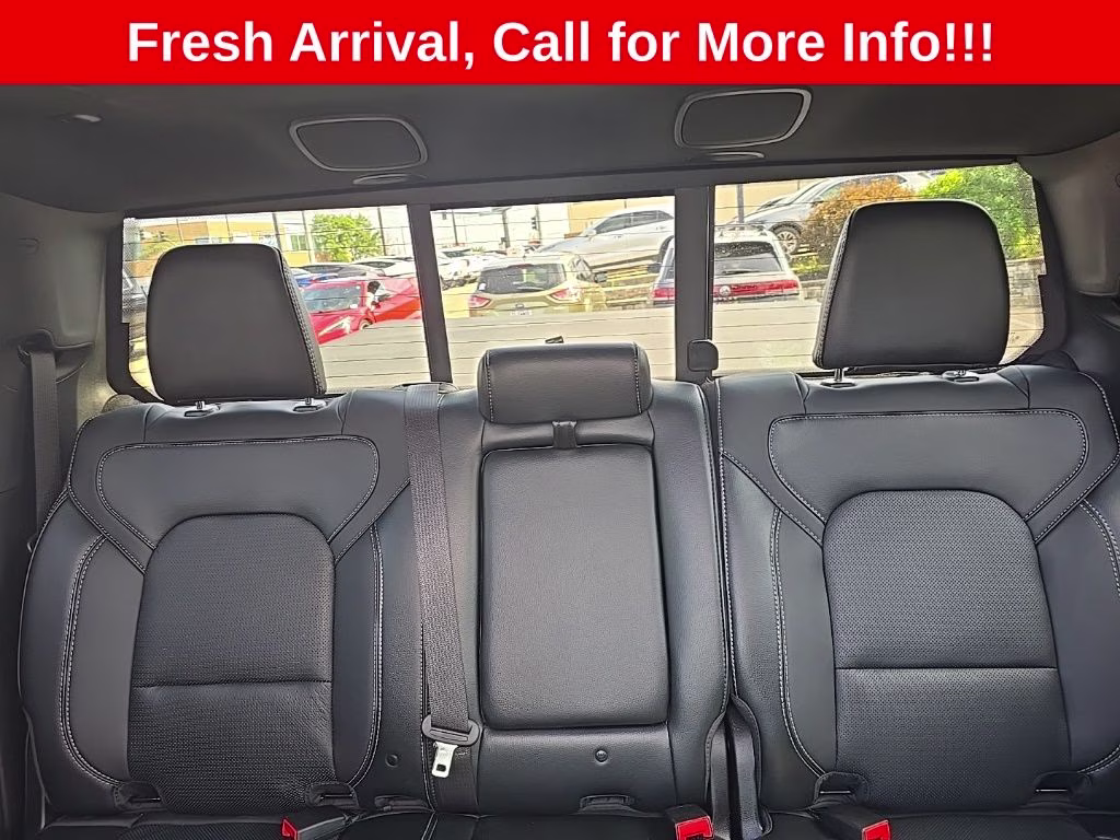 2025 Delmonico Red Pearlcoat Ram 1500 Rebel 4X4 Truck