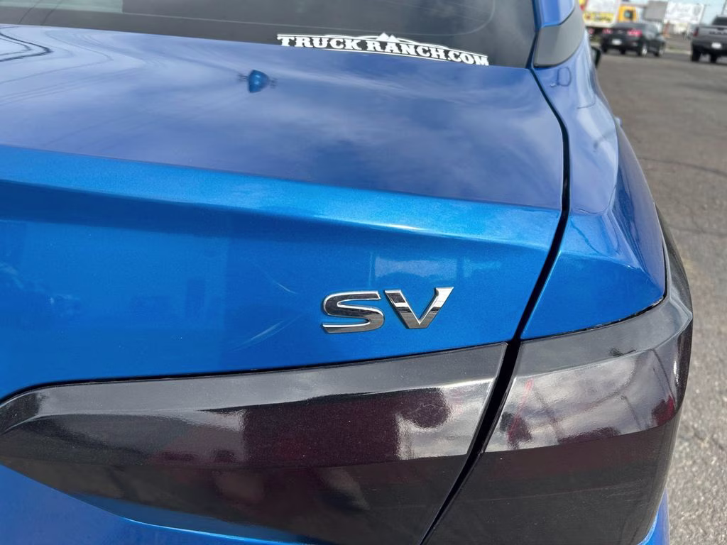 2021 Electric Blue Metallic Nissan Versa 1.6 SV FWD Sedan