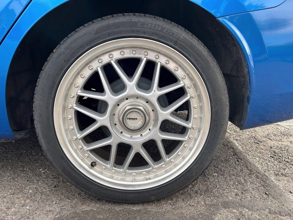 2021 Electric Blue Metallic Nissan Versa 1.6 SV FWD Sedan