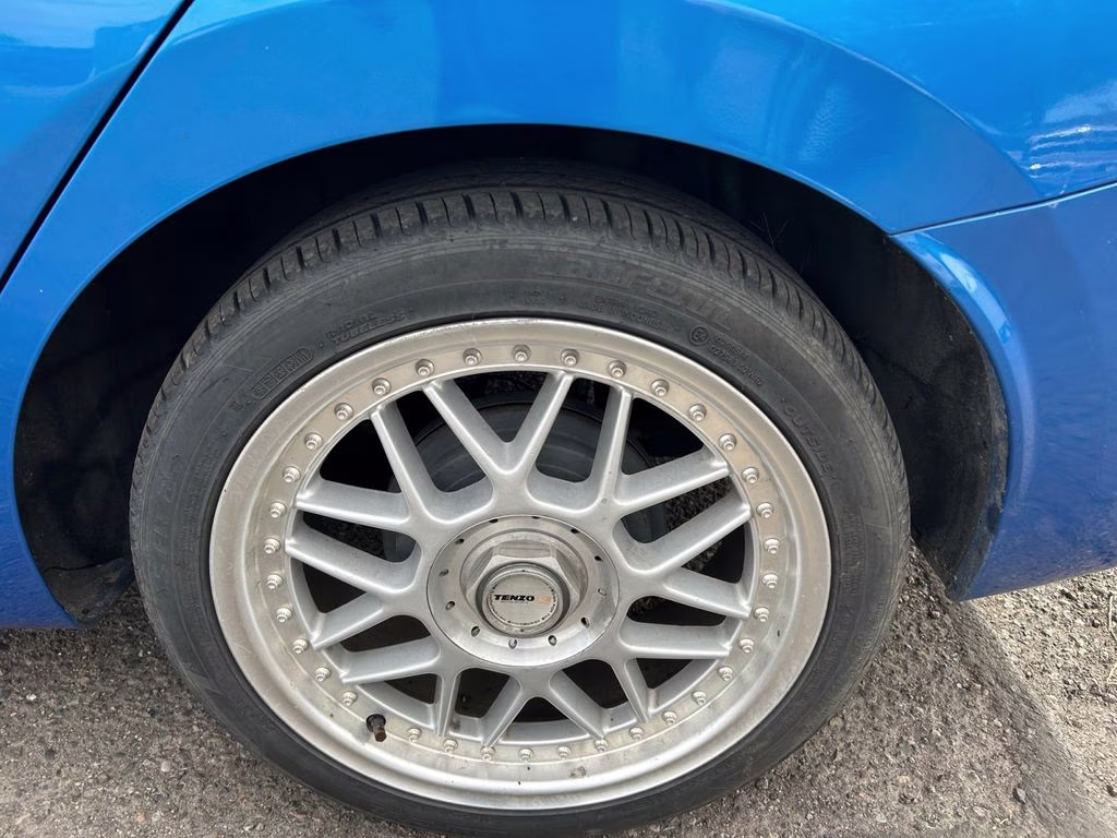 2021 Electric Blue Metallic Nissan Versa 1.6 SV FWD Sedan