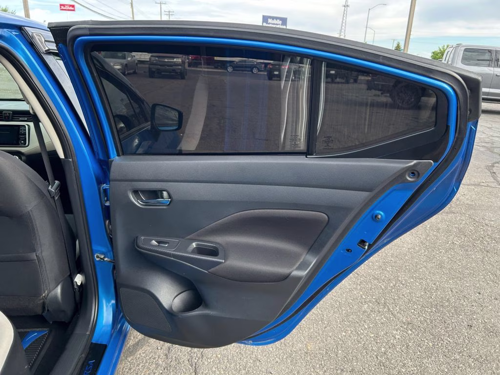 2021 Electric Blue Metallic Nissan Versa 1.6 SV FWD Sedan