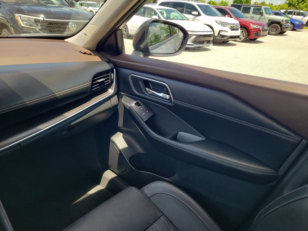 2023 Boulder Gray Pearl/Super Black Nissan Rogue Platinum FWD SUV