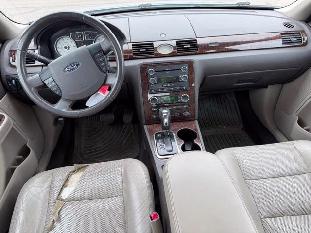 2008 Light Ice Blue Clearcoat Metallic Ford Taurus Limited FWD Sedan