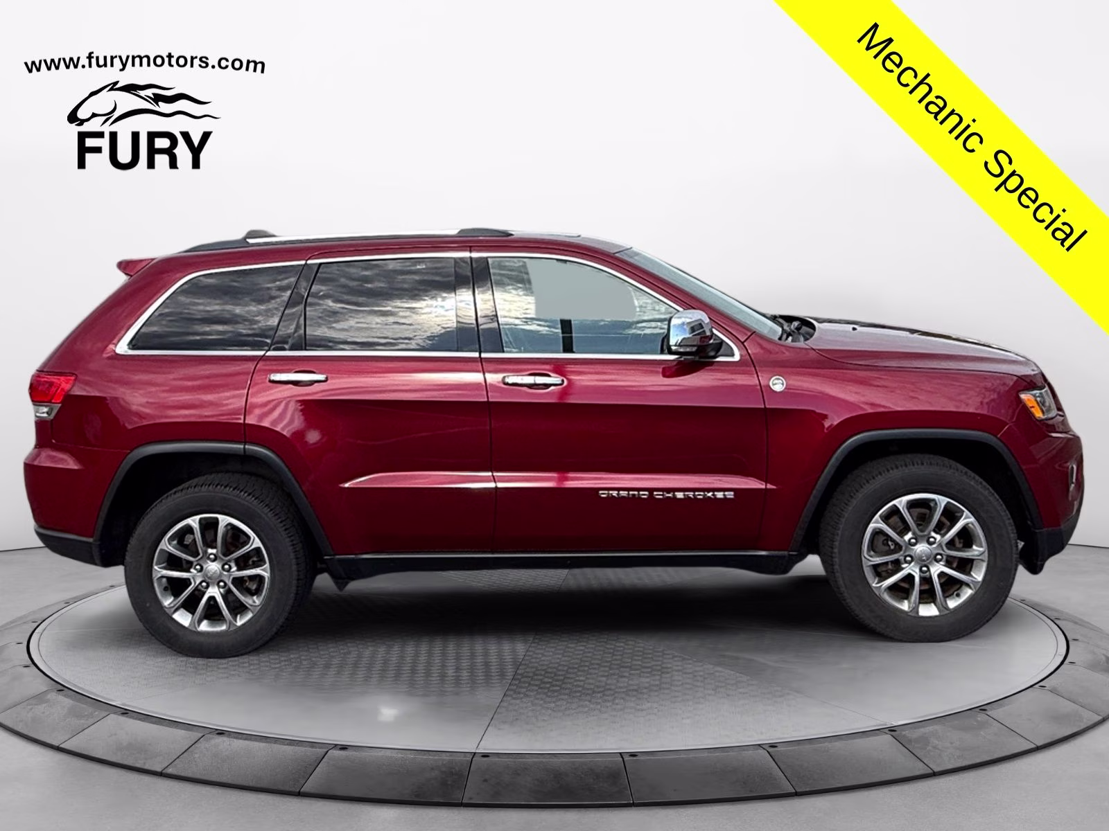 2015 Deep Cherry Red Crystal Pearlcoat Jeep Grand Cherokee Limited 4X4 SUV