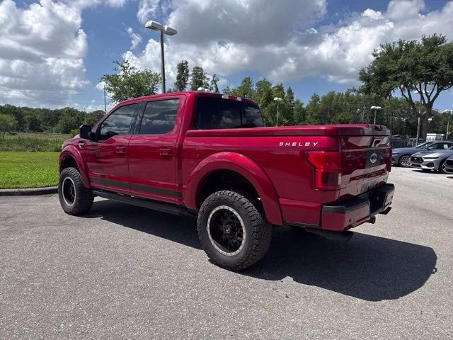 2020 Rapid Red Metallic Tinted Clearcoat Ford F-150 LARIAT Crew Cab Pickup 4X4 Truck