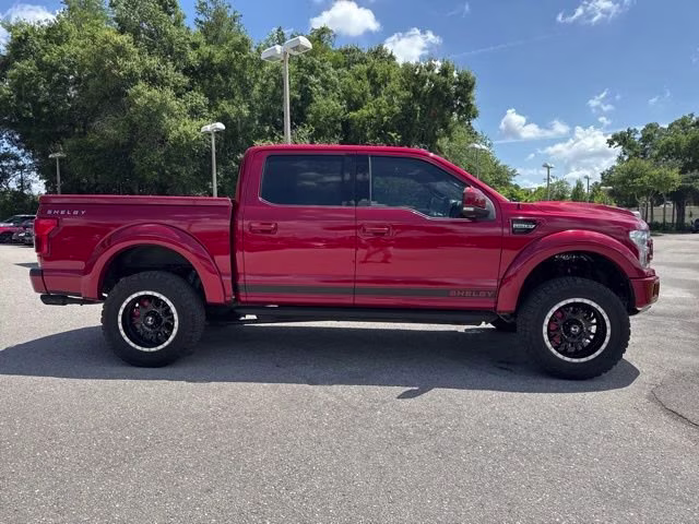 2020 Rapid Red Metallic Tinted Clearcoat Ford F-150 LARIAT Crew Cab Pickup 4X4 Truck