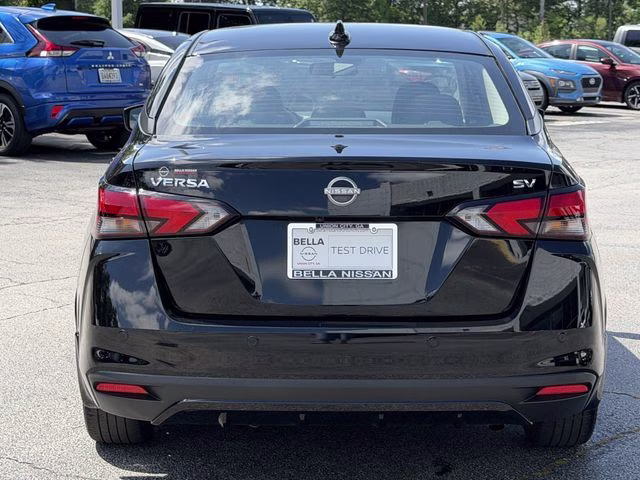 2024 Super Black Metallic Nissan Versa 1.6 SV FWD Sedan