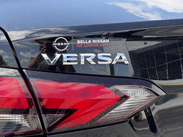 2024 Super Black Metallic Nissan Versa 1.6 SV FWD Sedan
