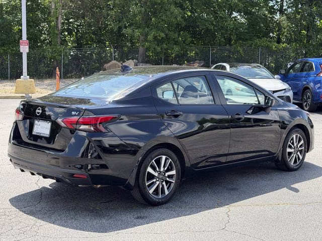 2024 Super Black Metallic Nissan Versa 1.6 SV FWD Sedan