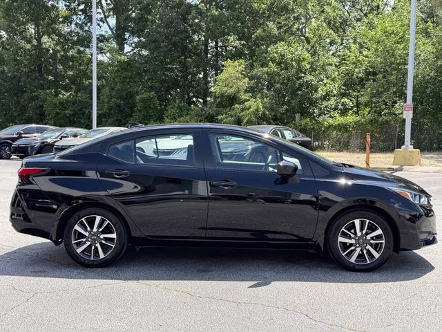 2024 Super Black Metallic Nissan Versa 1.6 SV FWD Sedan