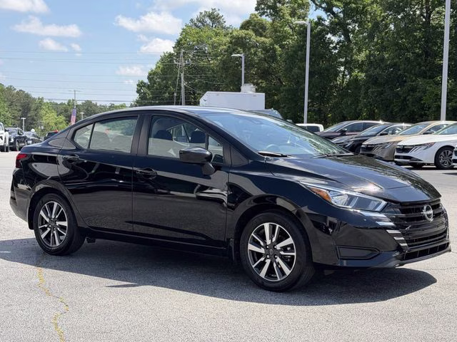 2024 Super Black Metallic Nissan Versa 1.6 SV FWD Sedan