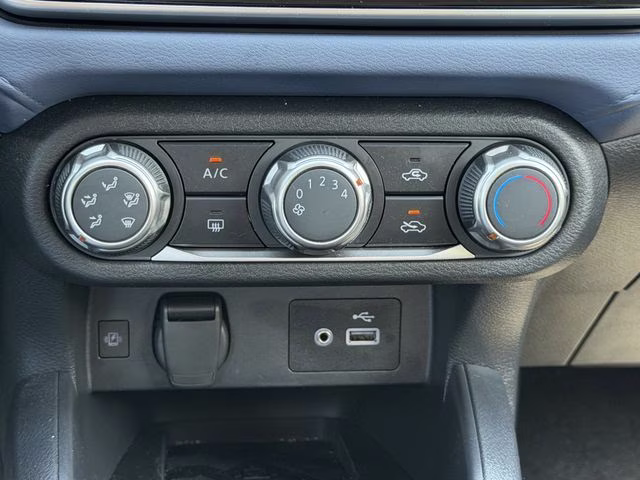 2024 Super Black Metallic Nissan Versa 1.6 SV FWD Sedan
