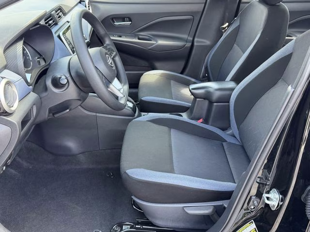 2024 Super Black Metallic Nissan Versa 1.6 SV FWD Sedan