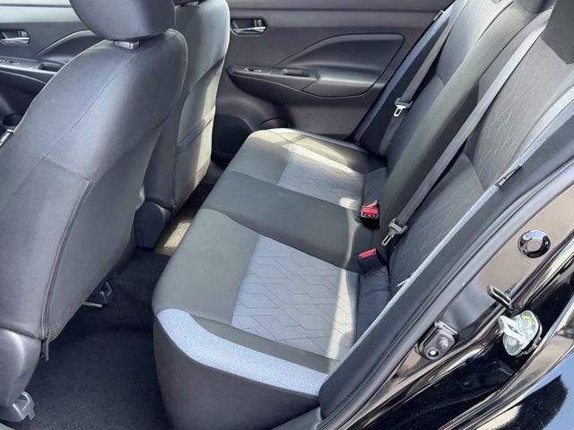 2024 Super Black Metallic Nissan Versa 1.6 SV FWD Sedan