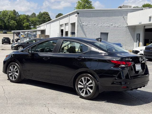 2024 Super Black Metallic Nissan Versa 1.6 SV FWD Sedan