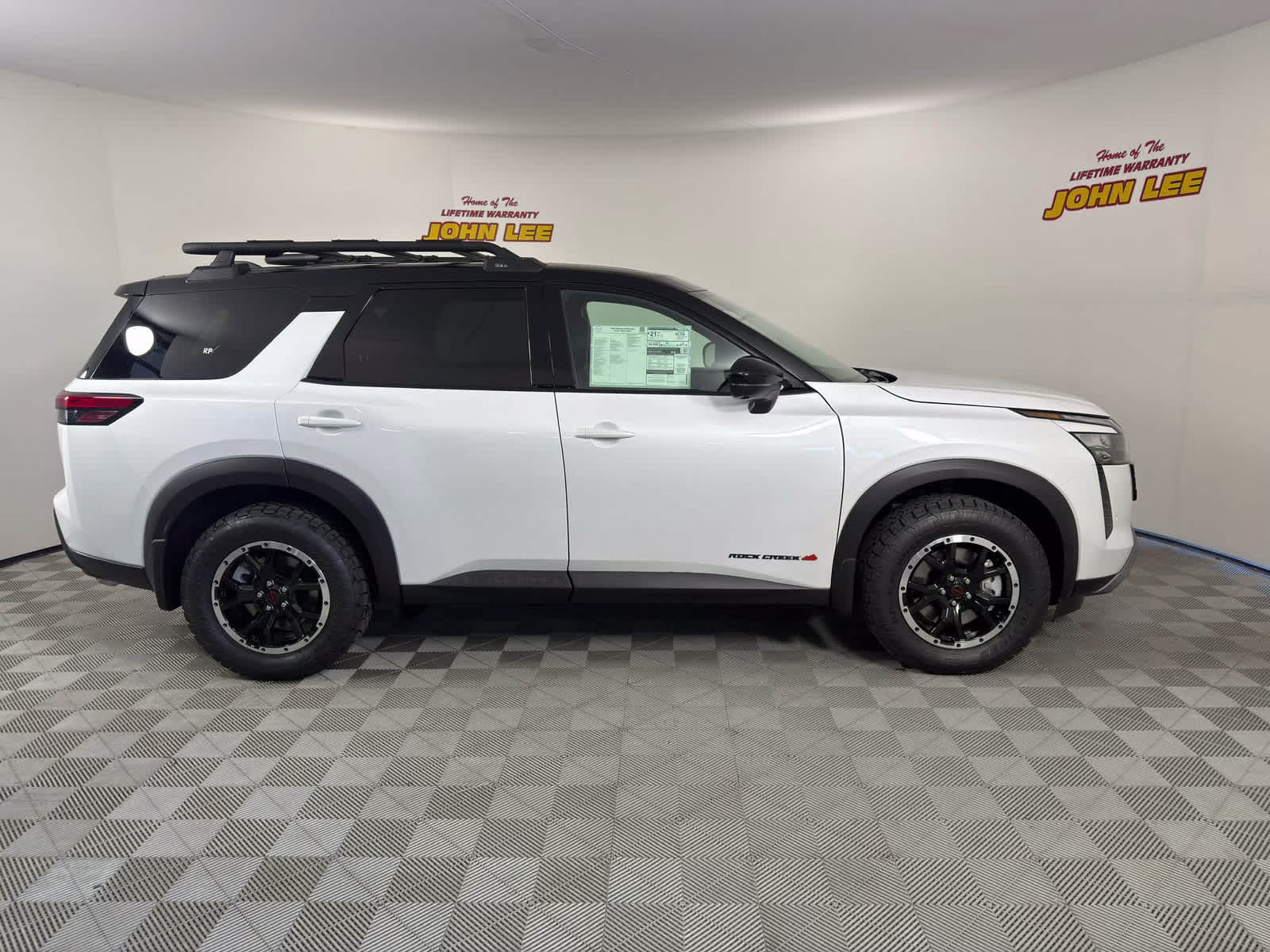 2026 Everest White Pearl Tricoat/Super Black Nissan Pathfinder Rock Creek 4X4 SUV