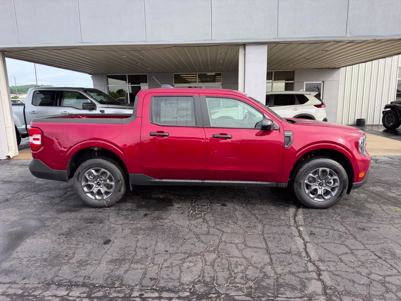 2026 Ruby Red Metallic Tinted Clearcoat Ford Maverick XLT AWD Truck