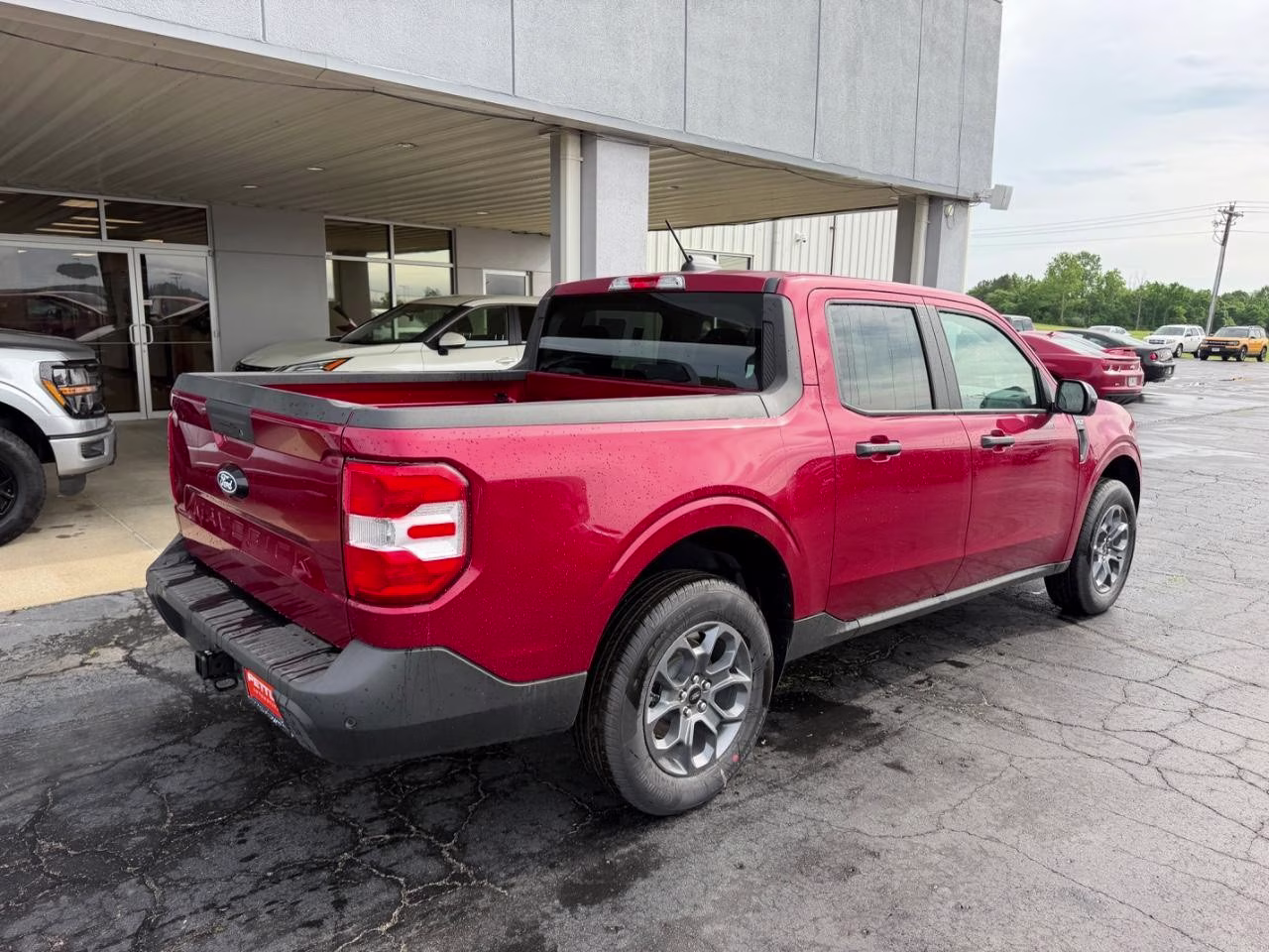 2026 Ruby Red Metallic Tinted Clearcoat Ford Maverick XLT AWD Truck