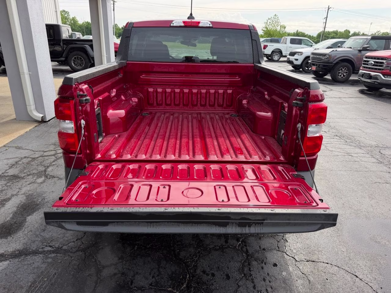 2026 Ruby Red Metallic Tinted Clearcoat Ford Maverick XLT AWD Truck