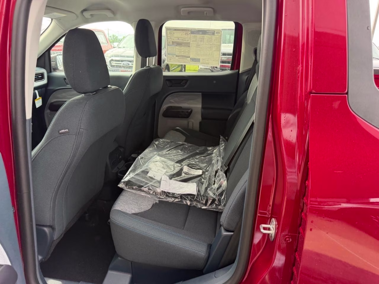 2026 Ruby Red Metallic Tinted Clearcoat Ford Maverick XLT AWD Truck
