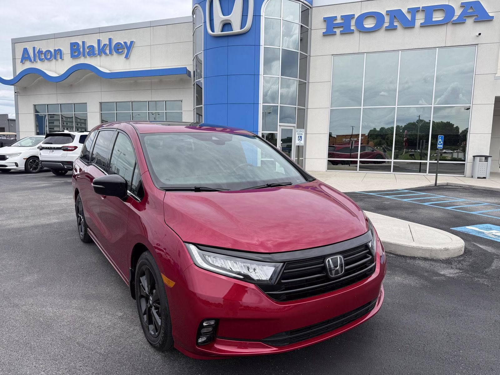 2023 Radiant Red Metallic II Honda Odyssey Sport FWD Van
