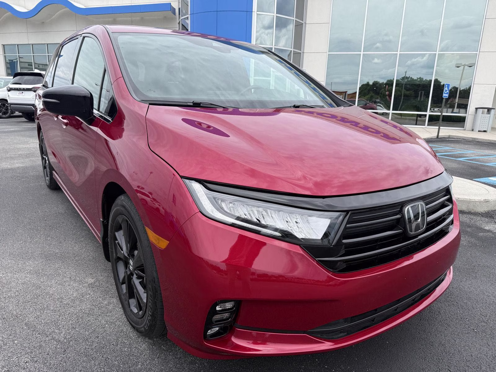 2023 Radiant Red Metallic II Honda Odyssey Sport FWD Van