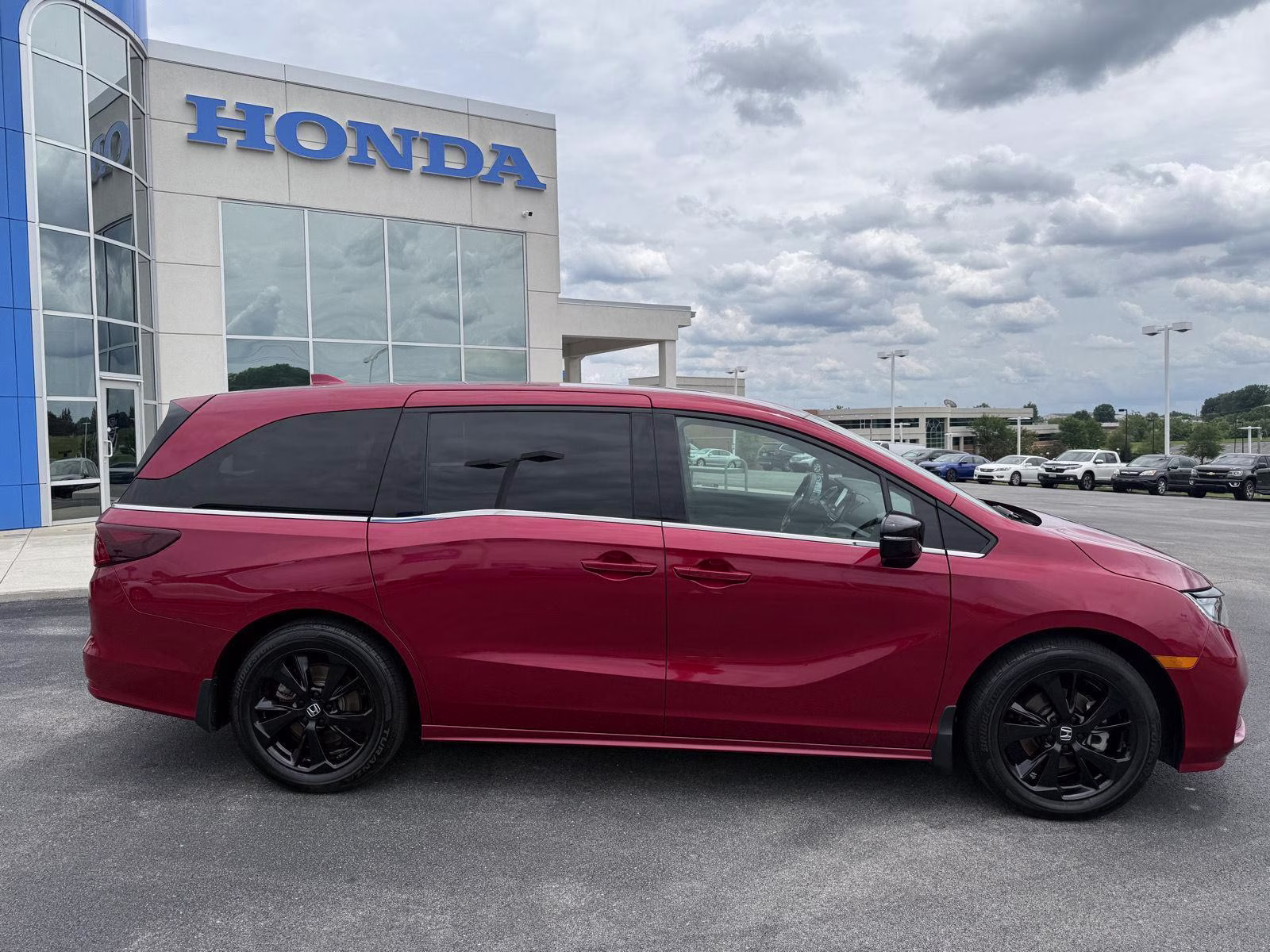 2023 Radiant Red Metallic II Honda Odyssey Sport FWD Van