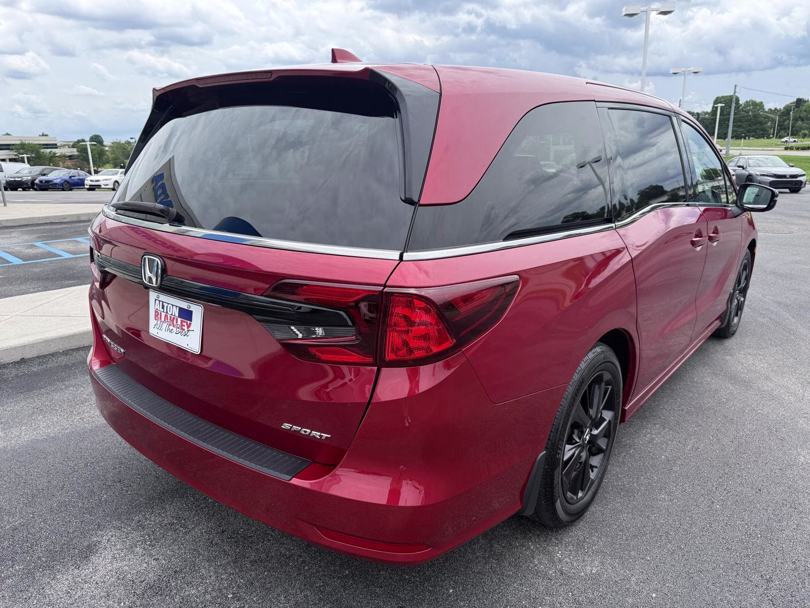 2023 Radiant Red Metallic II Honda Odyssey Sport FWD Van